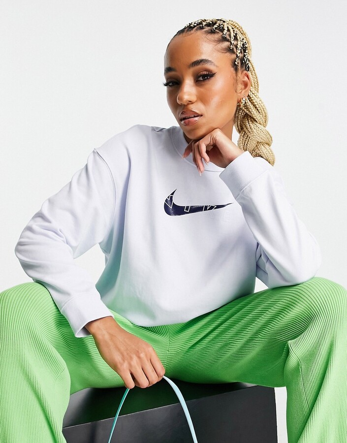 Nike Training GRX oversized crew sweat in light blue - ShopStyle Activewear  Tops