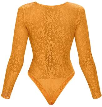 PrettyLittleThing Fuchsia Lace V Neck Long Sleeve Thong Bodysuit