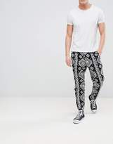 Thumbnail for your product : ASOS Design Tapered Smart Pants In Aztec Design