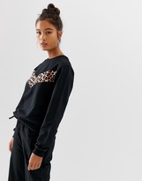 Thumbnail for your product : ASOS DESIGN tracksuit with animal paneled sweat / skinny jogger