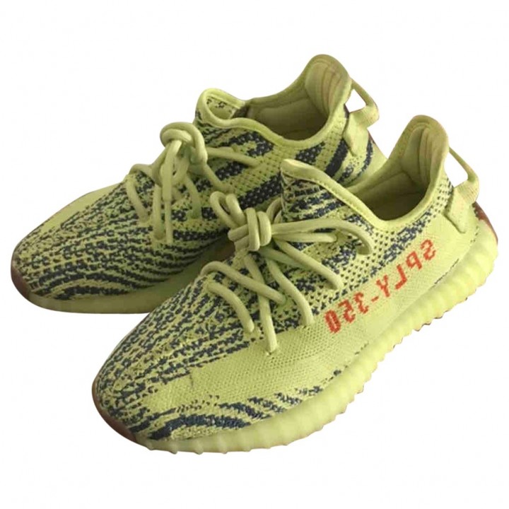 yellow adidas trainers