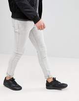 Thumbnail for your product : ASOS DESIGN Super Skinny Jeans In Light Gray With Abrasions