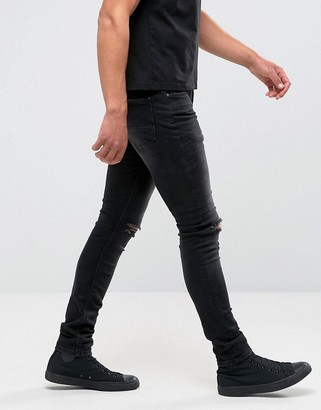 ASOS DESIGN super skinny 12.5oz jeans with knee rips in washed black -  ShopStyle