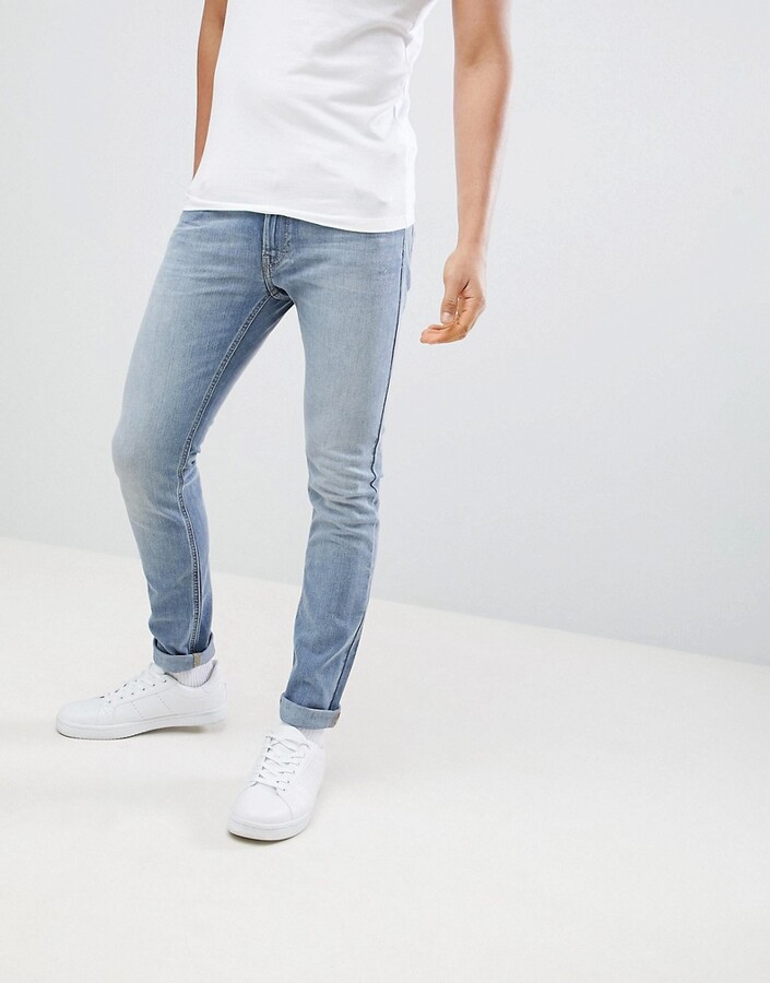 Vleien marketing Boodschapper Lee Jeans Luke Skinny Jeans in Worn Out Blue - ShopStyle
