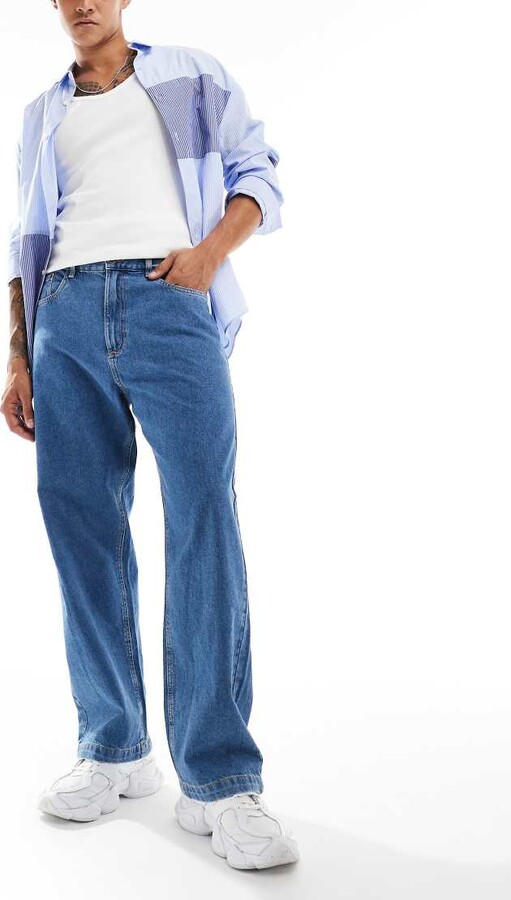 ADPT super baggy jeans in mid wash blue ShopStyle