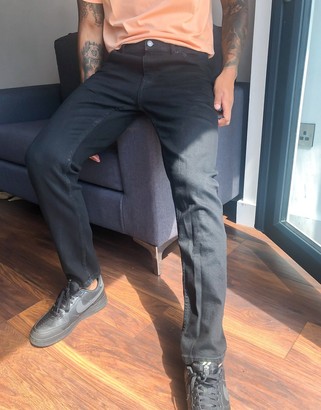 Bershka slim fit jeans in black - ShopStyle