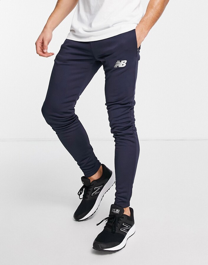New Balance Football slim fit knitted joggers in navy - ShopStyle Trousers