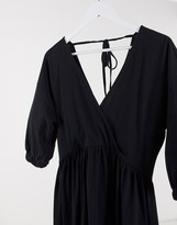 Thumbnail for your product : ASOS DESIGN midi smock dress with wrap top in black