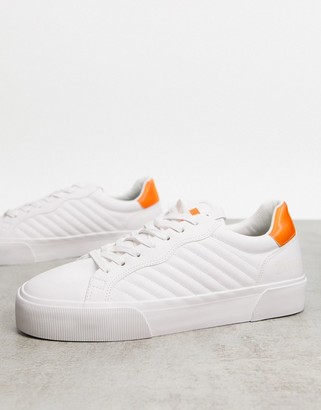 orange platform sneakers