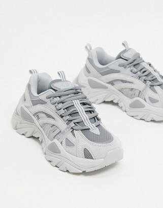 grey fila trainers