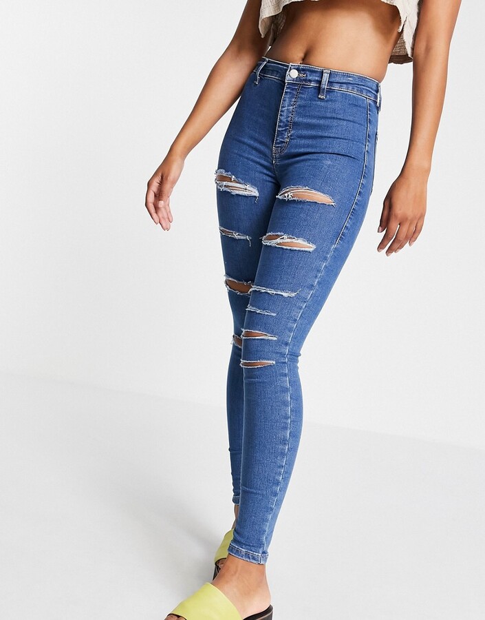Topshop Joni jeans with super-rips in mid blue - ShopStyle