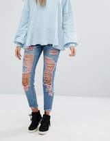 Thumbnail for your product : Missguided Riot Super Ripped Pink Jeans