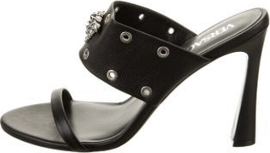 Versace Leather Slides Black Includes Box & Dust Bag Unfortunately, due to restrictions, this item may not be eligible for shipping in all areas.