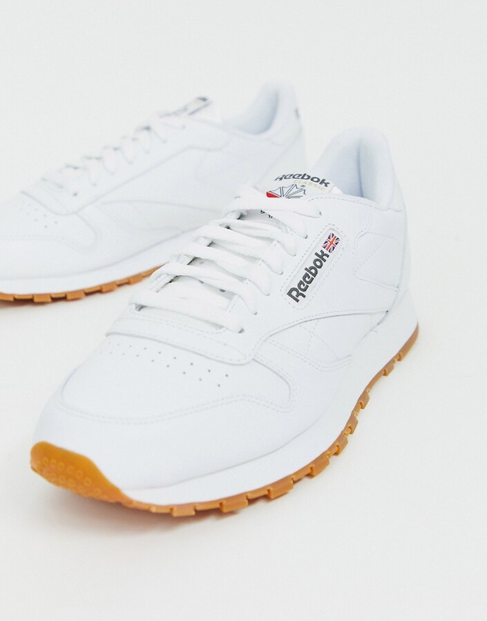 white leather reebok trainers
