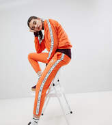 Thumbnail for your product : Puma Exclusive To ASOS Taped Side Stripe Track Pants In Orange