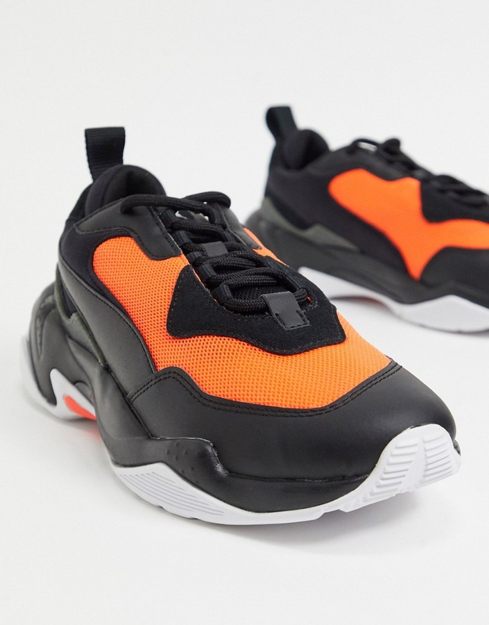 Puma Thunder 2.0 sneakers in black and red - ShopStyle