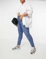 Thumbnail for your product : ASOS Curve DESIGN Curve high rise 'lift and contour' skinny jeans in midwash
