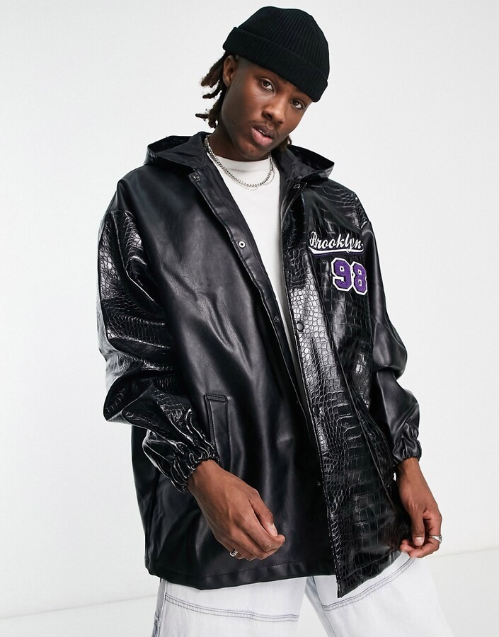 ASOS DESIGN oversized varsity bomber jacket in navy with faux leather  sleeves