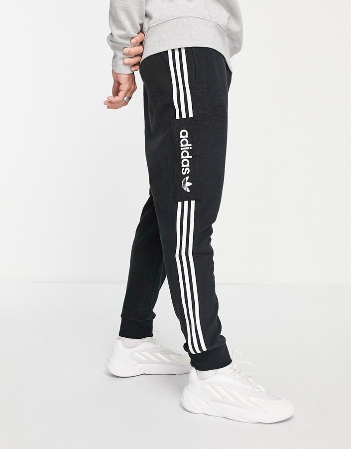adidas three stripe sweatpants with cuff in black - ShopStyle Pants