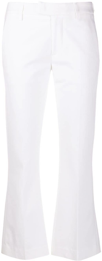 white kick flare trousers