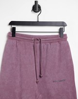 Thumbnail for your product : Collusion Unisex oversized joggers in purple acid wash co