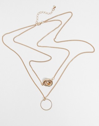 ASOS DESIGN Curve multirow necklace with knot pendant and open circle in gold tone