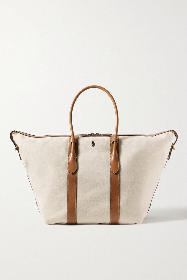 Leather-trimmed embroidered canvas tote