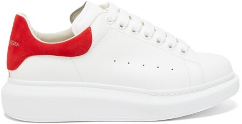 red and white trainers