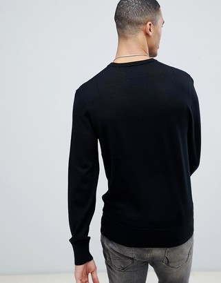 AllSaints 100% merino crew neck jumper in black with ramskull logo