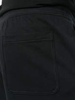 Thumbnail for your product : Nike colour block raw edge shorts