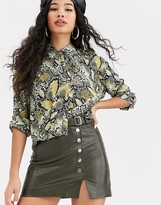 Thumbnail for your product : Bershka faux leather mini skirt with button detail in khaki