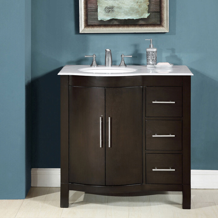 https://img.shopstyle-cdn.com/sim/82/64/8264ddc0f47d12239c0d91e3dbc1e757_best/silkroad-exclusive-36-inch-single-sink-carrara-white-marble-stone-top-bathroom-vanity.jpg