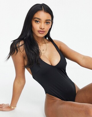 ASOS DESIGN Fuller Bust supportive twist strappy low back swimsuit in black