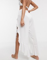 Thumbnail for your product : ASOS DESIGN ruffle split front beach pants with tie waist in white