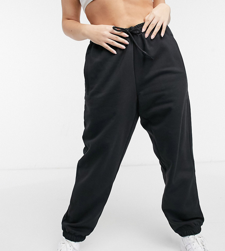 adidas 'Cozy Comfort' Plus oversized cuffed sweatpants in black - ShopStyle  Activewear Pants