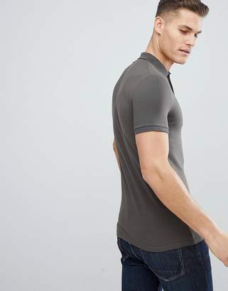 ASOS DESIGN muscle fit jersey polo in khaki