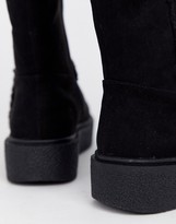 Thumbnail for your product : ASOS DESIGN Aquarius faux fur flat boots in black
