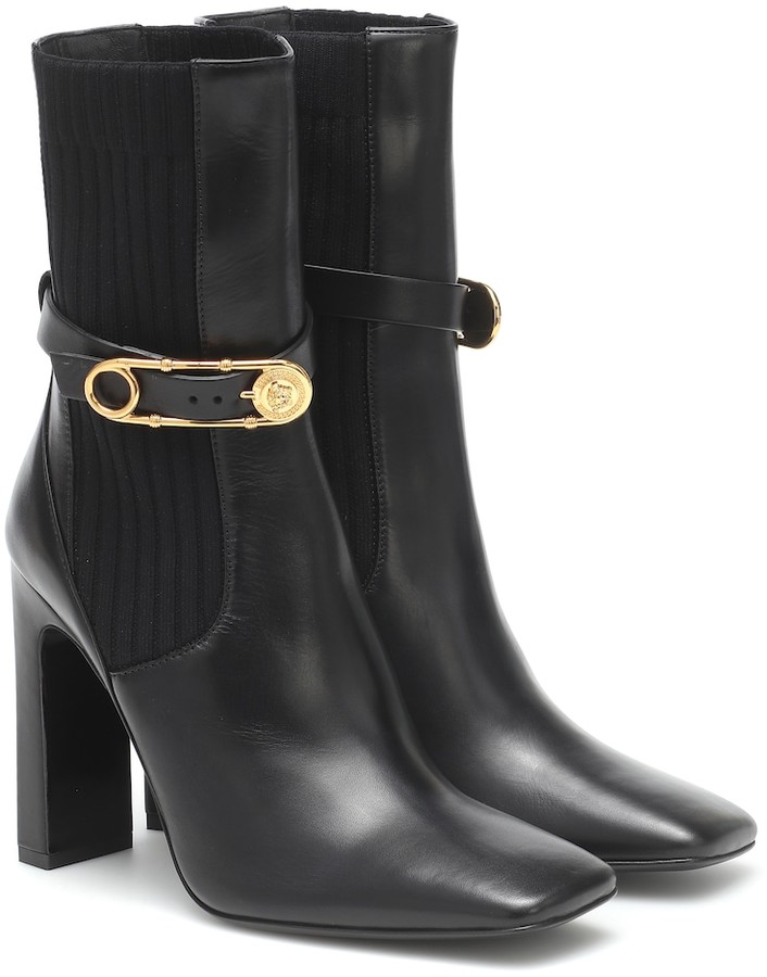 Versace Safety Pin leather ankle boots ShopStyle