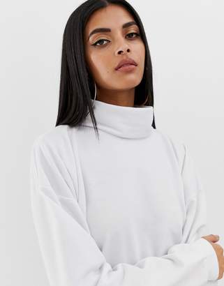 PrettyLittleThing roll neck sweatshirt in white