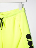 Thumbnail for your product : Diadora Junior TEEN logo-print drawstring-waist swim shorts