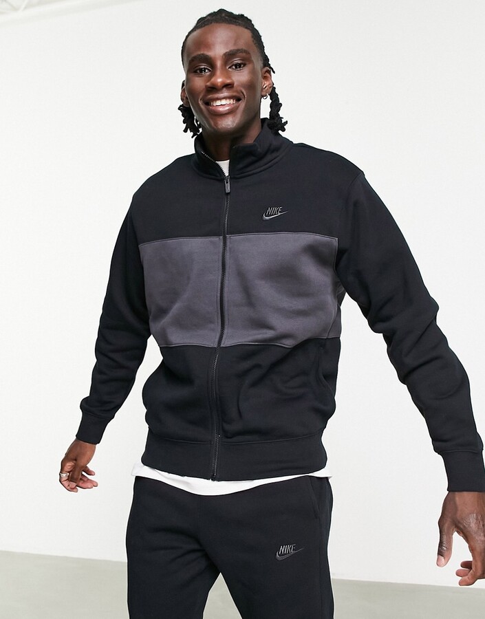 Nike Colourblock fleece zip up tracksuit set in black - ShopStyle Activewear
