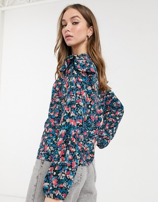 New Look high neck shoulder frill blouse in blue floral