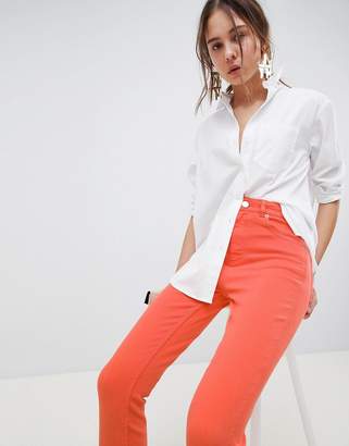 ASOS Design DESIGN Farleigh high waisted slim mom jeans in neon orange with contrast stitch