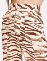 Thumbnail for your product : Finders Keepers Garcia animal print pants in brown