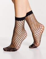 Fishnet Socks | Shop the world's largest collection of fashion | ShopStyle  UK