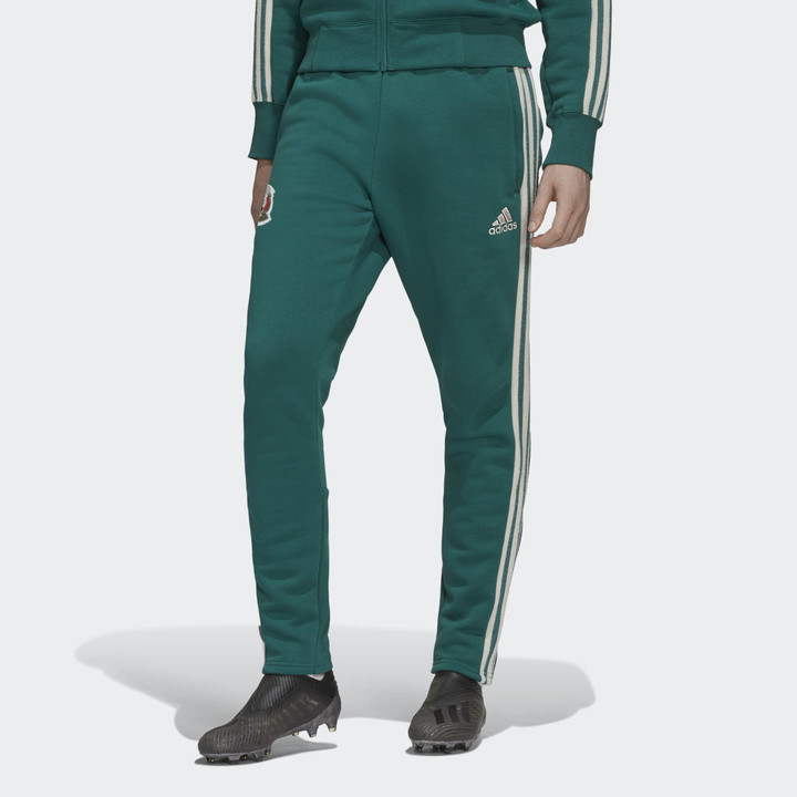 green adidas track pants mens