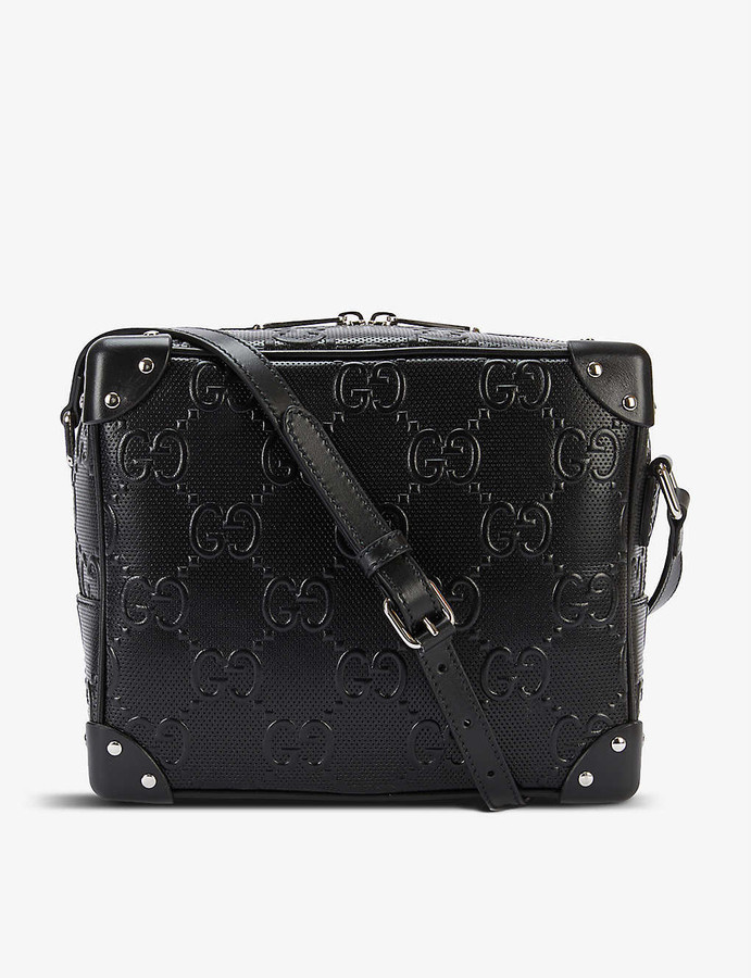 Gucci GGembossed leather messenger bag ShopStyle