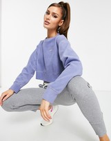 Thumbnail for your product : Nike Training Icon Clash fleece top in blue