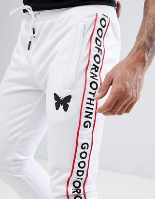ASOS Good For Nothing Skinny Joggers In White With Logo Side Stripes Exclusive to