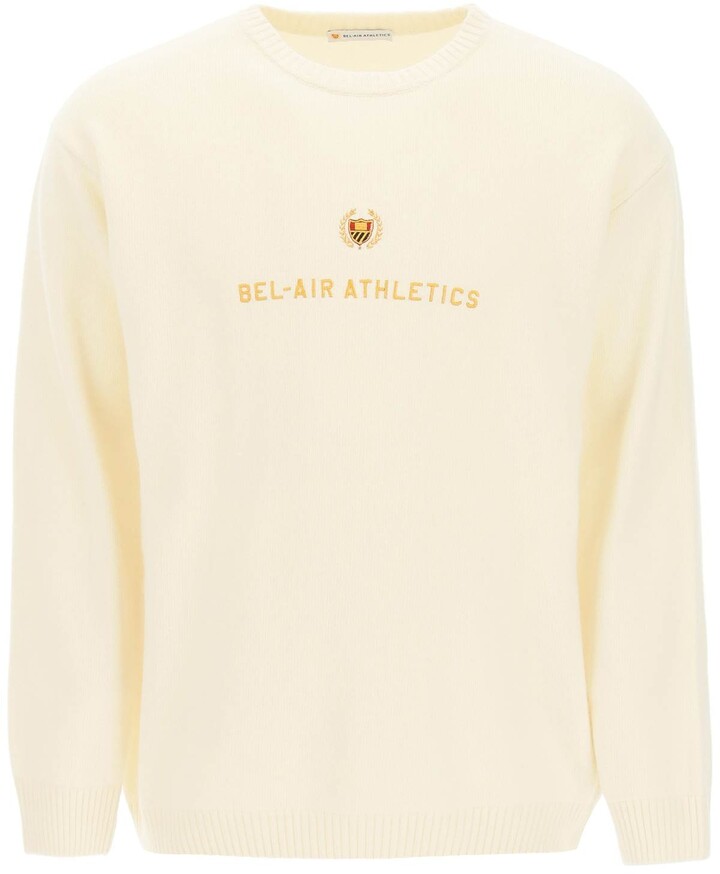 gold and white sweater